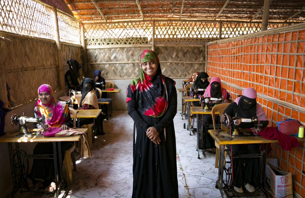Rohingya refugee women working in a UN Women multipurpose support centre